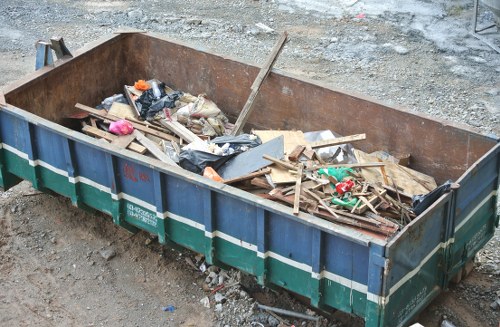 Modern Skip Hire team preparing a skip bin for delivery