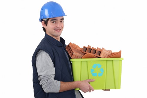 Professional muck removal team at a construction site in Morden