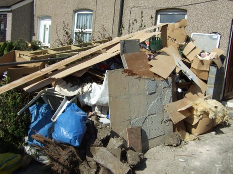 Demolition waste being sorted for recycling